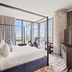 Placemakr Premier Sobro bedroom with canopy bed and city view in Nashville
