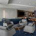 Courtyard by Marriott Pittsburgh Airport Settlers Ridge lobby lounge with armchairs, bar seating and TV