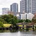 Tokyu Stay Shimbashi Tokyo skyline view with a park, bridge, and waterfront