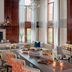 Residence Inn by Marriott West Orange lobby lounge with fireplace, seating area and buffet table