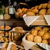Motel One Frankfurt-Messe breakfast buffet with assorted bread rolls, pastries, and fruit in Frankfurt am Main