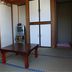 Minshuku Hayashi in Kamogawa room with tatami mats, low table, storage cabinets and tv