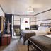 High Country Motor Lodge in Flagstaff guest room with two beds, vintage decor, and large window