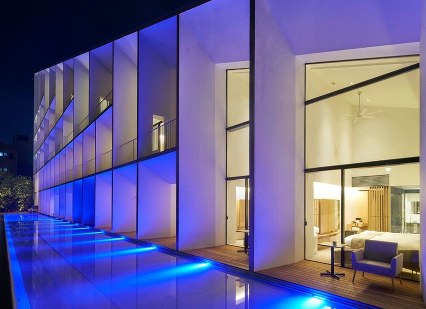 Garden Terrace Saga Hotels & Resorts in Saga, illuminated modern hotel exterior with blue-lit walkway