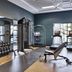 Renaissance Phoenix Glendale Hotel & Conference Center gym with dumbbells, machines and benches