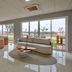 Comfort Hotel Serra da Canastra lobby with large windows and seating in São João Batista do Glória