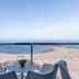 AZ Hotel Vague D'or in Algiers balcony with table, chairs and sea view over a sandy beach