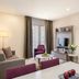 Somerset Medini Iskandar Puteri in Gelang Patah living room with sofa, TV, and dining table