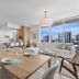 Miami Vacation Rentals - Coconut Grove, Miami: bright condo dining area with city skyline view and sofa seating