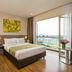 Somerset Medini Iskandar Puteri bedroom with king bed, sofa, and city view balcony in Gelang Patah