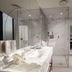 Dorsett Gold Coast Broadbeach bathroom with marble vanity, glass shower and dressing area