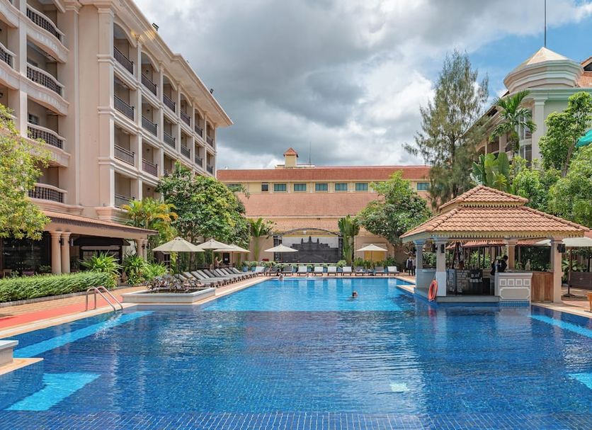 Somadevi Angkor Premium in Siem Reap with a large outdoor pool and poolside cabana