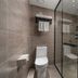 Hanting Hotel Dongguan Changan Wanda bathroom with toilet and glass-enclosed shower in Dongguan