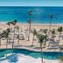 Iberostar Selection Coral Bávaro in Punta Cana with beachfront pool, palm trees, and turquoise ocean