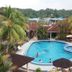 Hotel Seri Malaysia Mersing in Mersing with a tropical outdoor pool and palm trees