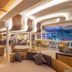Khaolak Emerald Beach Resort & Spa in Phangnga lobby lounge with bar seating and warm wood accents