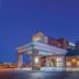 La Quinta Inn & Suites by Wyndham Philadelphia Airport in Essington at dusk, exterior entrance