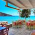Cyclades Beach Apartments in Platis Gialos: seaside terrace dining with tables overlooking the beach