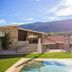 Hotel Rural Casa de Samaioes in Chaves with outdoor pool, sun loungers and mountain views