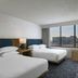 Sheraton Philadelphia University City Hotel guest room with two beds and city view in Philadelphia
