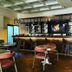 Michelangelo Boutique Hotel Dalyan bar lounge with counter seating and shelves of bottles in Ortaca