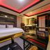Daegu Innovalley in Daegu: modern guest room with king bed, massage chair, and red LED ceiling lights