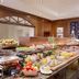 Das Alpenhaus Gasteinertal in Bad Hofgastein breakfast buffet with fruit, pastries and salad bar
