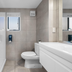 Tasman Holiday Parks - Christchurch bathroom with shower, toilet, and vanity in a modern tiled space