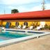 Scottish Inn Downtown Jacksonville in Jacksonville with an outdoor pool and lounge chairs