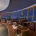 Lera Hotel Guangzhou lounge with curved skyline windows and city night view