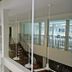 Chern Bangkok in Bangkok lobby atrium with hanging pendant lights and a staircase to upper floor