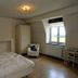 La Maison De Maitre in Arbrefontaine: guest room with bed, chair, wardrobe and window view