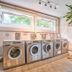 Residhome Bures La Guyonnerie laundry room with washing machines and dryer in Bures-sur-Yvette