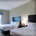 Hampton Inn Crystal River guest room with two beds and window view