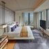 Mandarin Oriental, Tokyo bedroom with floor-to-ceiling city views and a large bed