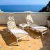 Palazzo Marzoli Resort in Positano, terrace with two lounge chairs and a sea view