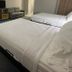 Days Inn by Wyndham Jefferson City room with two beds, desk, lamp and TV in Jefferson City