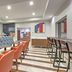 Holiday Inn Express & Suites Dallas - Grand Prairie I-20 By IHG lobby breakfast area with seating and bar stools