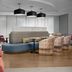 Home2 Suites by Hilton Lake City lobby seating area with colorful chairs and curved sofa