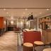Holiday Inn London - Bloomsbury By IHG lounge with bar seating and herringbone wood flooring
