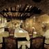 Romantik Hotel Kasteel Daelenbroeck in Herkenbosch wine cellar dining room with long table and vaulted brick arches