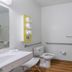 Motel 6 Junction City, Ks accessible bathroom with toilet, shower curtain, grab bars and sink