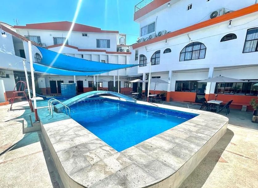 Hotel Moreno in Ciudad Valles with outdoor pool, sun shade, and courtyard seating