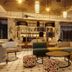 Le Corail Apart'Hotel & Splash Park lobby lounge in Hammamet with patterned seating and warm pendant lights