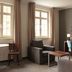 Apart Neptun, Gdansk: hotel room with seating area, desk, wall TV, and large windows