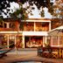 Villas Sur Mer in Negril with a wooden deck, small plunge pool, and hammock beside a two-story villa