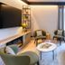 Campanile Nature - Cahors lounge with sofa, chairs, coffee table and garden-view glass doors