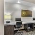 Best Western Porterville Inn business center with two computers and desk seating in Porterville