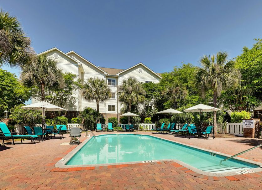 Homewood Suites by Hilton Charleston - Mt. Pleasant pool with lounge chairs and palm trees