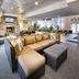 Club Wyndham Long Wharf in Newport lobby with stone fireplace, sectional seating and lounge area